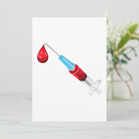 Medische spuit met bloeddruppel kaart