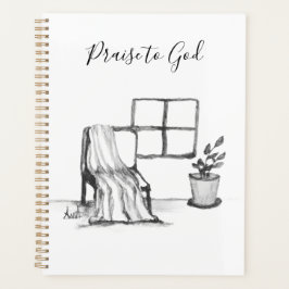Meditatie stoel bij raam met plant en deken planner