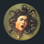 Medusa, Caravaggio Magneet<br><div class="desc">Medusa - Schilder van de Italiaanse barokschilder Caravaggio op een leder jousting. Michelangelo Merisi da Caravaggio (1571 - 1610) was tussen 1593 en 1610 een Italiaanse artiest die actief was in Rome, Napels, Malta en Sicilië. Zijn schilderijen, die een realistische waarneming van de menselijke staat combineren, zowel fysiek als emotioneel,...</div>
