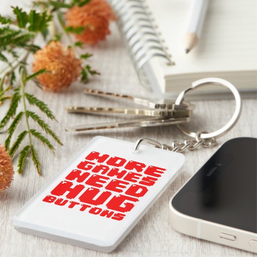 MEER GAMES HEBBEN HUG-BUTTONNEN NODIG SLEUTELHANGER (Voorkant Rechts)