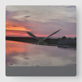 MEER ZONSONDERGANG GLOEIEN VIERKANTE KLOK