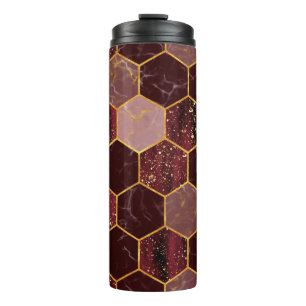 Meerbaar hexagon naadloze textuur met goud thermosbeker