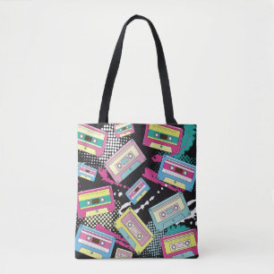 Meerdere gekleurde cassettes op een zwarte achterg tote bag