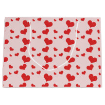 Meerdere rode harten op een schattige cadeautas