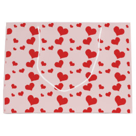 Meerdere rode harten op een schattige cadeautas