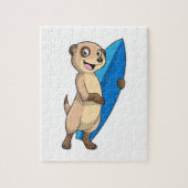 Meerkat als surfer met surfboard legpuzzel (Verticaal)