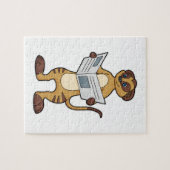 Meerkat leest een krant legpuzzel (Horizontaal)