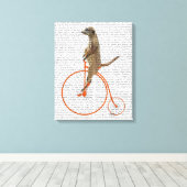 Meerkat over Oranje Penny Farthing Canvas Afdruk (Insitu (Houten vloer))