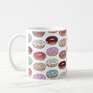 Meerkleurige donuts worden naadloos met de hand ge koffiemok