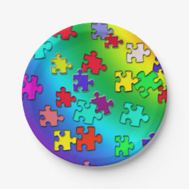 Meerkleurige puzzelstukjes voor puzzels papieren bordje