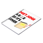 Meet een boek niet op zijn cover notitieboek (Linkerzijde)