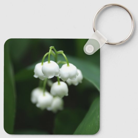 Mei witte lileugen sleutelhanger (Achterkant)