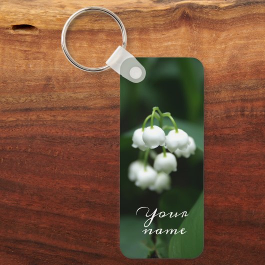 Mei witte lileugen sleutelhanger (Voorkant)