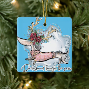 Meisje dachshund door de sneeuw keramisch ornament