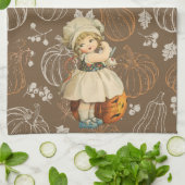Meisje dat appel kerft Halloween Theedoek (Gevouwen)
