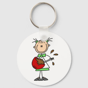 Meisje dat beslag mengt T-shirts en cadeaus Sleutelhanger