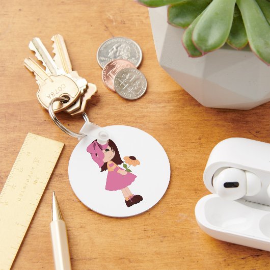 Meisje dat een ventilatorSleutelhanger houdt Sleutelhanger