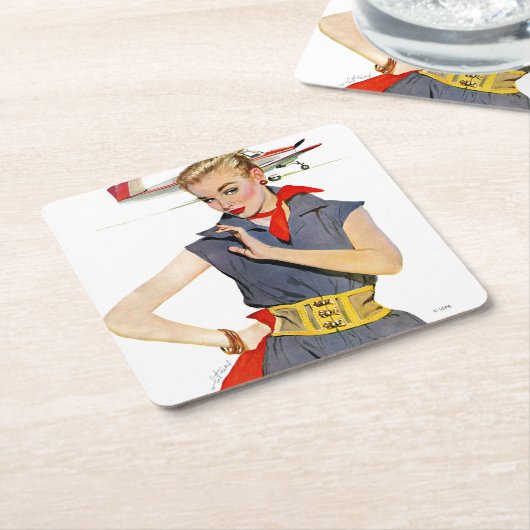 Meisje dat vliegvliegtuigen stort kartonnen onderzetters (Schuin)