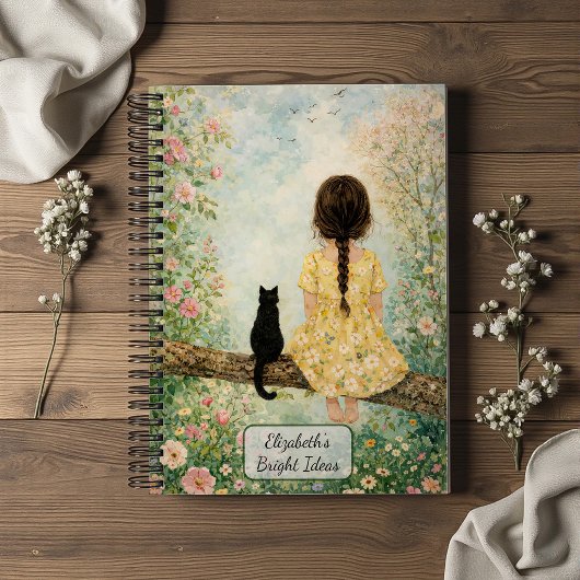 Meisje en kat in de lentetuin notitieboek