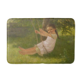 Meisje glimlachen op een zwaai ( kindertijd) badmat