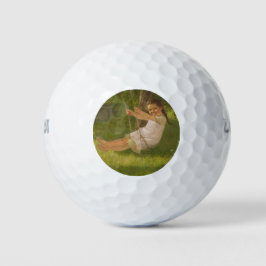 Meisje glimlachen op een zwaai ( kindertijd) golfballen