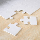 Meisje in een winterjas met sneeuw legpuzzel (Zijkant)