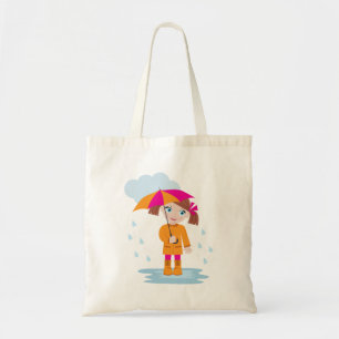 Meisje in oranje regenjas met roze paraplu tote bag