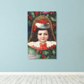 Meisje in Santa Hat in Bell Canvas Afdruk (Insitu (Houten vloer))