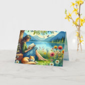 Meisje lezen van een boek onder een boom met een s kaart (Gele Bloem)