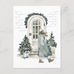 Meisje loopt op straat in de winter briefkaart