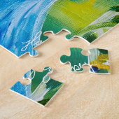 Meisje met bodes met bodes met een mooie puzzle legpuzzel (Zijkant)