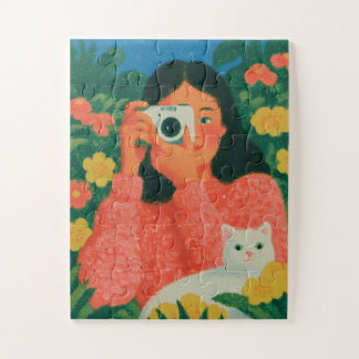 Meisje met camera en kat in de tuin legpuzzel