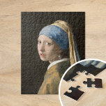 Meisje met een parel oorbel | Johannes Vermeer Legpuzzel<br><div class="desc">Meisje met de parel (ca. 1665) | Origineel kunstwerk van de Nederlandse barokschilder Johannes Vermeer (1632-1675). Vermeer staat bekend om het schilderen van taferelen uit de middenklasse. De meeste van zijn werken bevinden zich in dezelfde kamers van zijn eigen huis. Hij was in zijn leven geen bijzonder beroemde of rijke...</div>