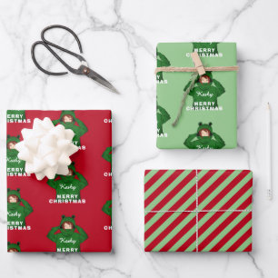 Meisje met groene kikkerkerst inpakpapier vel