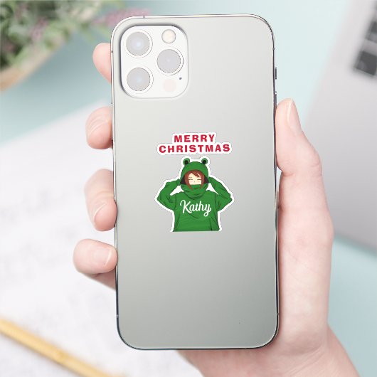 Meisje met groene kikkerkerst sticker (Telefoon)