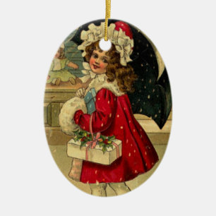 Meisje met kerstcadeau keramisch ornament