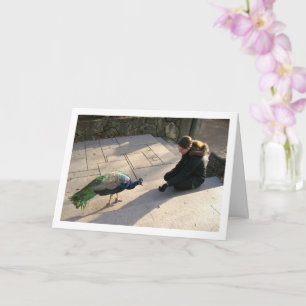 Meisje met pauw kaart