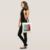 Meisje surft bij zonsondergang. tote bag (Voorkant (model))