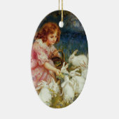 Meisje voert konijnen keramisch ornament (Rechts)