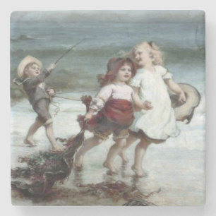 Meisjes die spelen als paarden op het strand stenen onderzetter