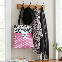 Meisjes en stippen drukken een monogram canvas tas