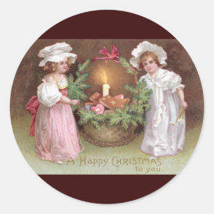 Meisjes met kerstkoekjes  ronde sticker