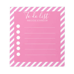 Meisjes roze en witte diagonale strepen om een lij notitieblok