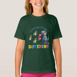 Meisjes T-shirt – Het is oké om anders te zijn 🦕�
