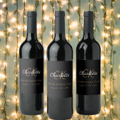 Meisjesuitje zwart gouden monogram wijn etiket