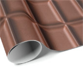 Melade chocolade die over een chocoladeblok druppe cadeaupapier (Rol Hoek)