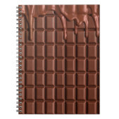 Melade chocolade die over een chocoladeblok druppe notitieboek (Voorkant)
