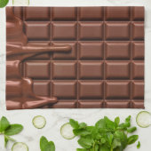 Melade chocolade die over een chocoladeblok druppe theedoek (Gevouwen)