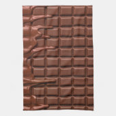 Melade chocolade die over een chocoladeblok druppe theedoek (Verticaal)