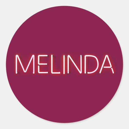 Melinda-naam in gloeiende neonlampen ronde sticker (Voorkant)